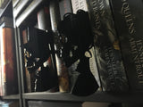 Mrs. Victorian skull bookshelf silhouette acrylic