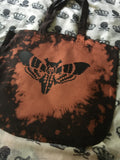 Death moth bleached tote bag